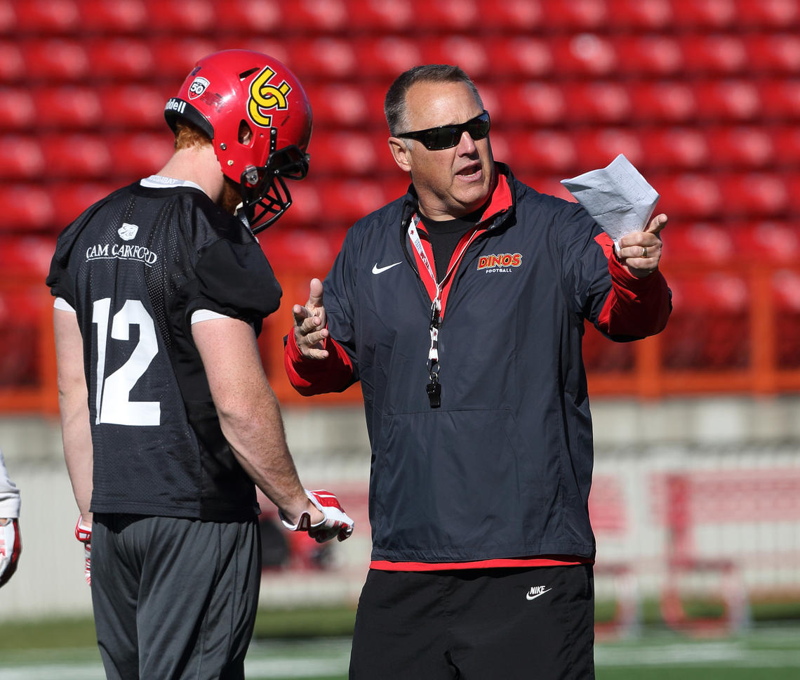 Wayne Harris Jr., head football coach of the University of Calgary Dinos, has been involved with the Dinos for close to 40 years as a player, alumnus, assistant coach and defensive co-ordinator.