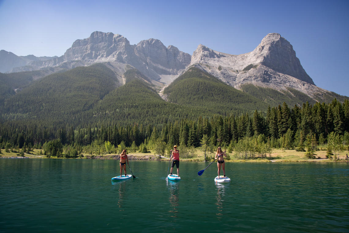Standup paddleboarding at Quarry Lake, near Canmore