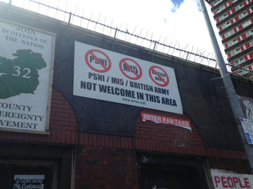 A sign along the Falls Road in Belfast, demonstrating that Police Service Northern Ireland (PSNI), MI5, and the British Army are not welcome in the area.
