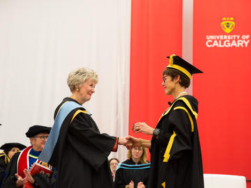 Students celebrate graduation at the 2019 fall convocation ceremony.