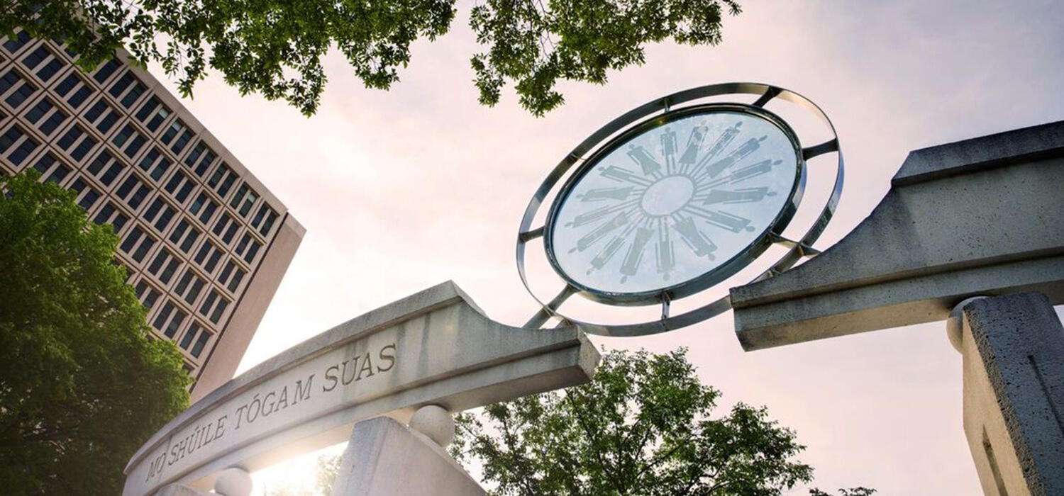 The sun shines through a landmark in UCalgary