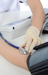 Person getting blood pressure checked