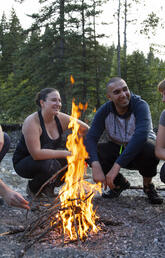 People gathered around a campfire