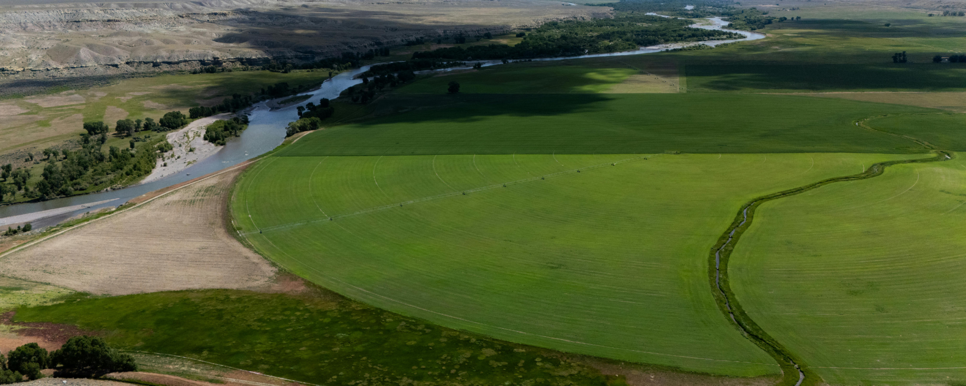 aerial view of a river and nearby fields
