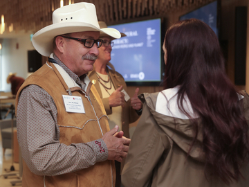 Two people in conversation