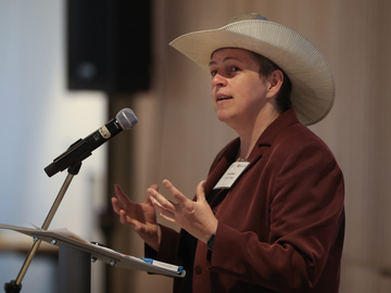 UCVM Dean speaking at a podium