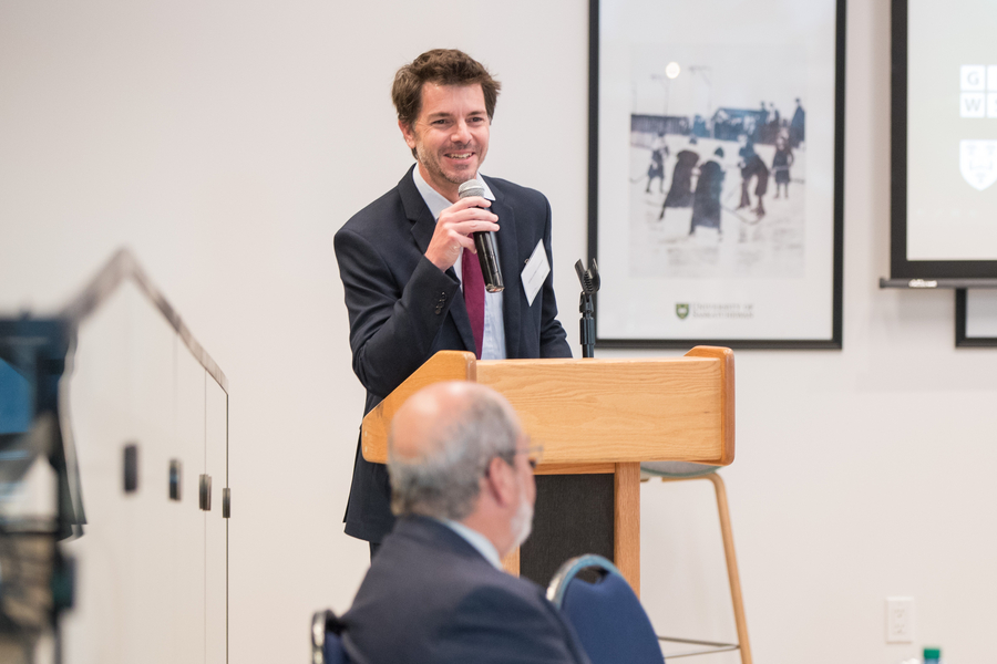 Guillaume Lhermie speaking at a podium